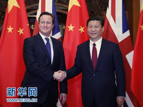 12月2日，國家主席習近平在北京釣魚臺國賓館會見英國首相卡梅倫。 新華社記者 鞠鵬 攝