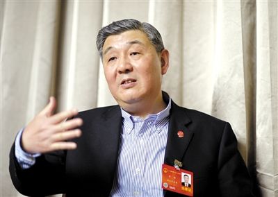 今年全國兩會期間，全國人大代表、浙江高院院長齊奇接受記者采訪。新京報記者 陳杰 攝