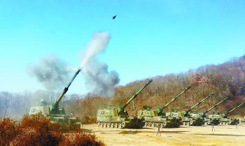 延坪島炮擊事件3周年之際，朝韓間口水仗不斷。圖為韓軍21日舉行應(yīng)對(duì)挑釁訓(xùn)練。