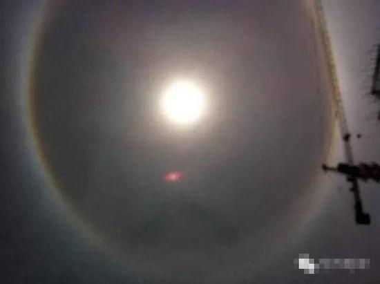 上?，F(xiàn)UFO 專家稱光圈是日暈亮點或是飛行器(圖)