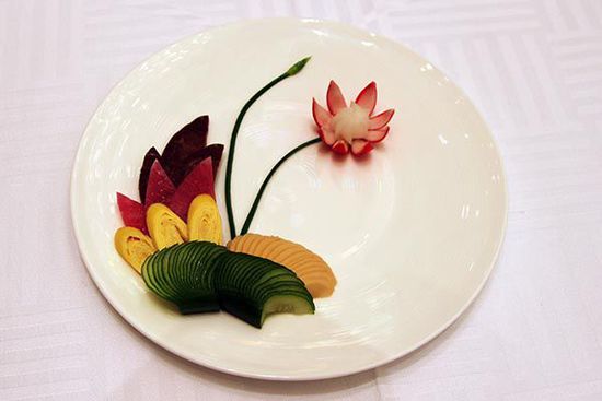 迎賓冷盤(pán)“洋花蘿卜”。 花惠生 供圖