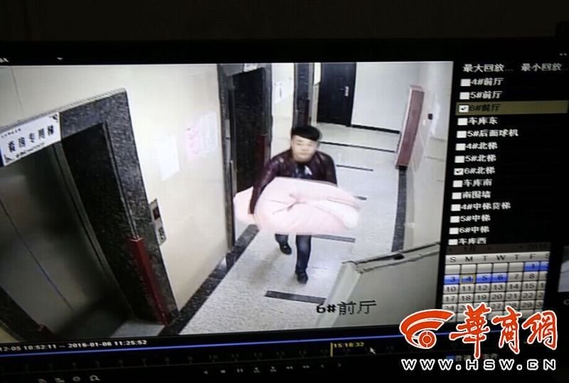 西安一小偷將保險箱包在被子里離開 過程僅15分鐘 西安一小偷將保險箱包在被子里離開 過程僅15分鐘